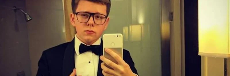 Youngest Crypto Millionaire: Erik Finman's $1,000 Bitcoin Bet and Lessons > ***- The first image shows young Erik in a tuxedo taking a selfie, likely the cover.*** for Meme Token Hunters
